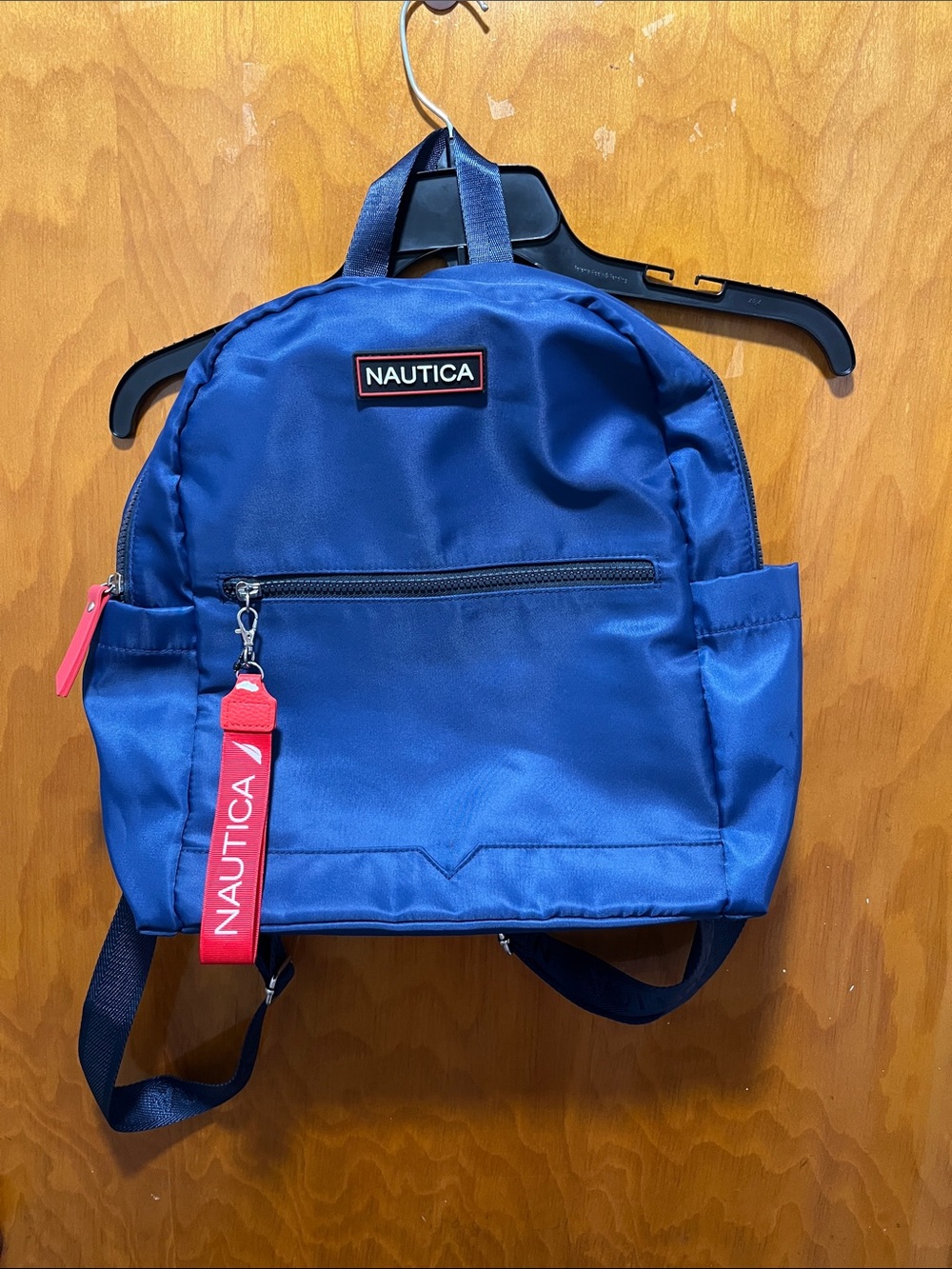 Nautica Navy Blue Mini Backpack with Red Branded Pull